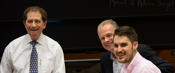 Patrick J. Healy with colleagues in a Harvard Business School classroom